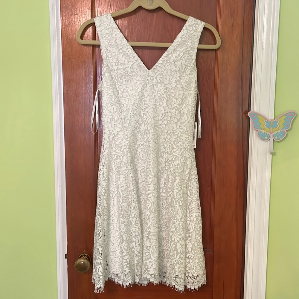 white sparkly flowy dress, never has been worn, still has tags on,